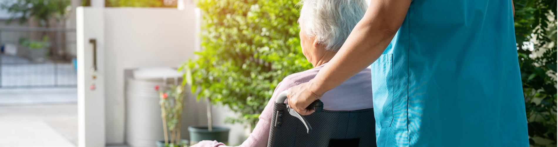 caregiver-help-and-care-asian-senior-or-elderly-old-lady-woman-patient-sitting-on-wheelchair.jpg-1900x500