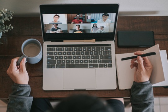 an-asian-chinese-male-working-at-home-using-laptop-video-conference-call-meeting-with-headset.jpg-540x360