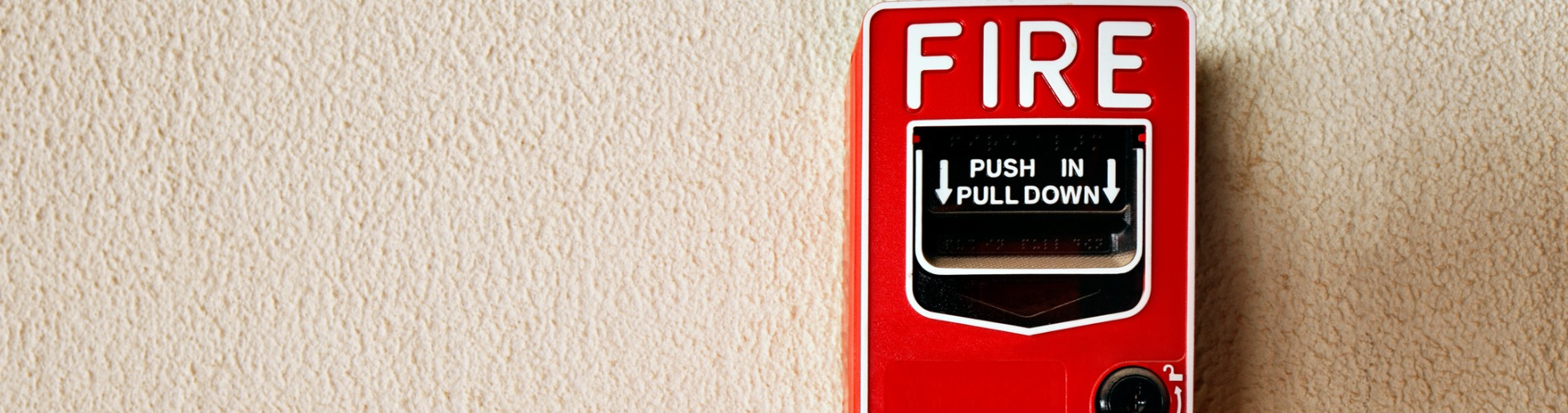 fire-alarm-button-on-a-wall.jpg-1900x500